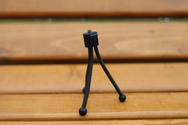 Mini esnek bir kamera tripodu, fotoğrafçılar ya da film yapımcıları ekipmanı.