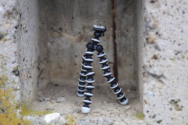 Mini esnek bir kamera tripodu, fotoğrafçılar ya da film yapımcıları ekipmanı.