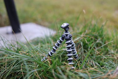 Mini esnek bir kamera tripodu, fotoğrafçılar ya da film yapımcıları ekipmanı.