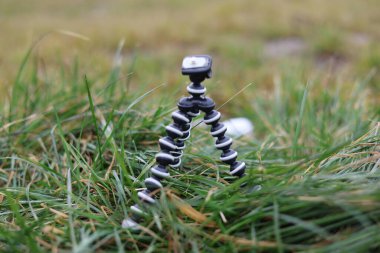 Mini esnek bir kamera tripodu, fotoğrafçılar ya da film yapımcıları ekipmanı.