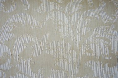 Yoğun bej bir kumaşın deseni ve bir süs. Tasarım için arka plan. pencere perdeleri.