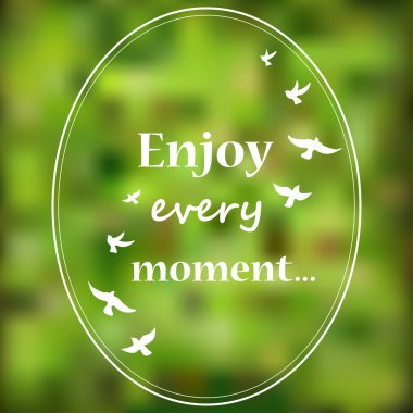 Enjoy every moment phrase on blur background