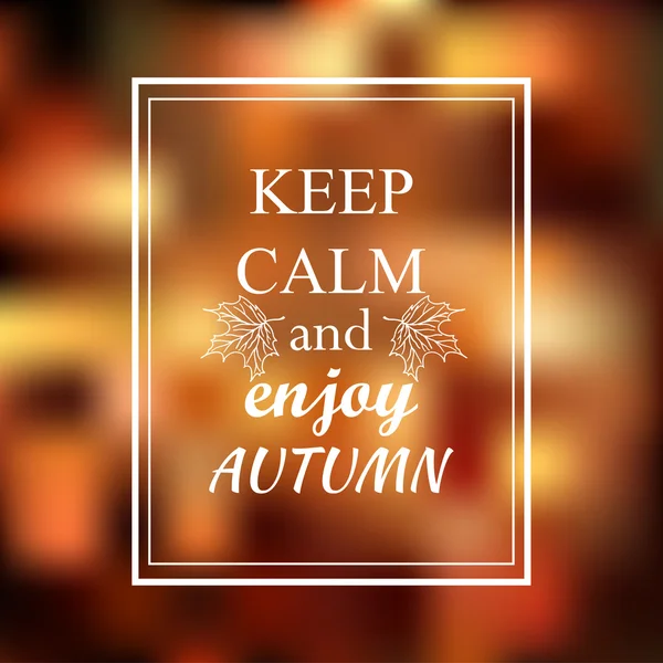 Keep calm and enjoy autumn phrase on orange blur background — Stock Vector