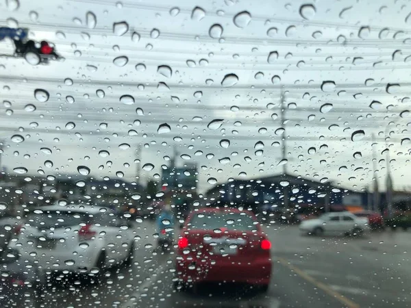 Rain Falling Car Windshield Colorful Bokeh Street Light Drive Car — Stock Photo, Image