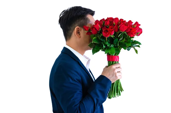 ชายเอเช ยสวมช าเง นกองท พเร อดอกก หลาบส แดงแยกก นในพ นหล — ภาพถ่ายสต็อก