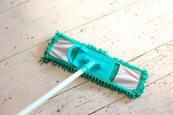 With my mop on the white wood floor — Stock Photo, Image