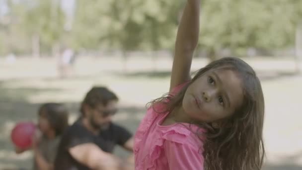 Front view of little girl mugging and posing for camera — Stock Video