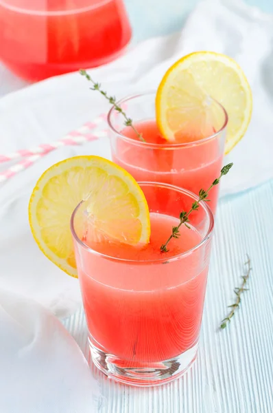 Fruit pink lemonade in glasses — Stock Photo, Image