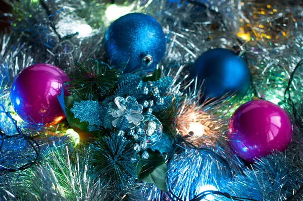 Christmas background with lights, tinsel, and Christmas balls — Stock Photo, Image