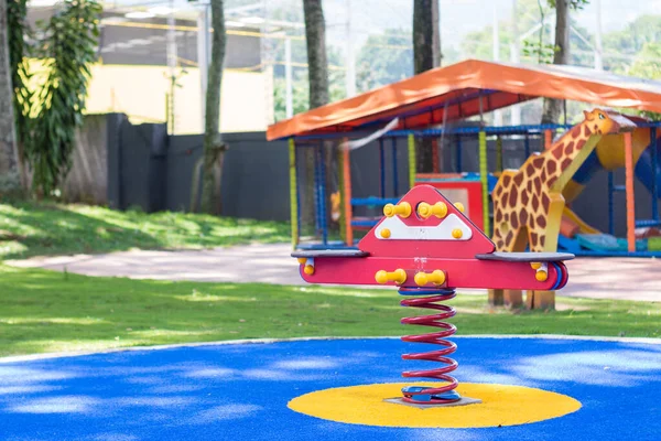 Parque Infantil Rojo Amarillo Con Primavera Parque —  Fotos de Stock