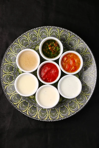 Bowls Various Sauces Plate Black Background Top View — Stock Photo, Image