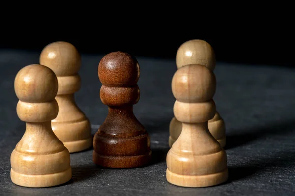 chess a good game for the brain and strategy. wooden chessborad. black vs white. conflict people