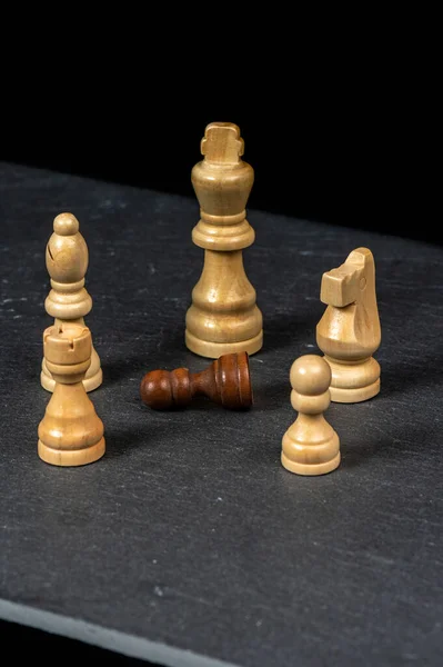 chess a good game for the brain and strategy. wooden chessborad. black vs white. conflict people