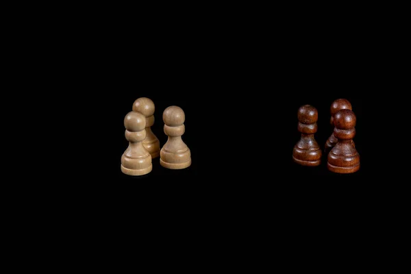 chess a good game for the brain and strategy. wooden chessborad. black vs white. conflict people