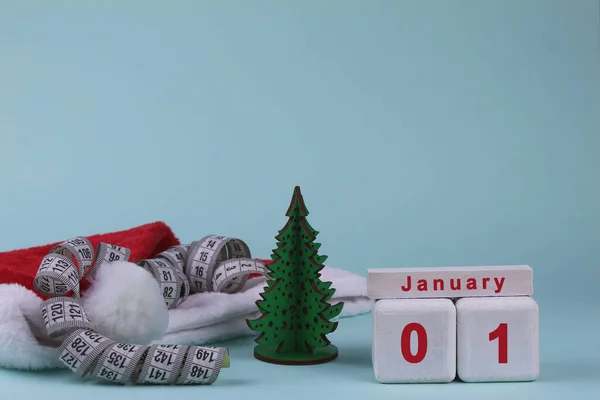 Enero Calendario Cubo Sombrero Cinta Métrica Santa Claus Sobre Fondo — Foto de Stock