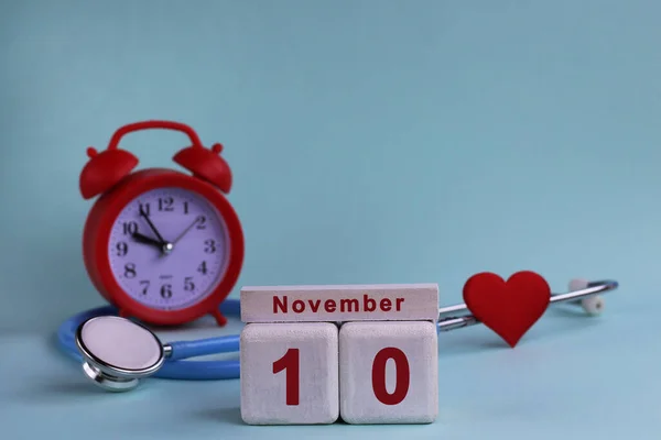 November 10Th White Wooden Blocks Calendar Date Clock Stethoscope Blue — Stock Photo, Image