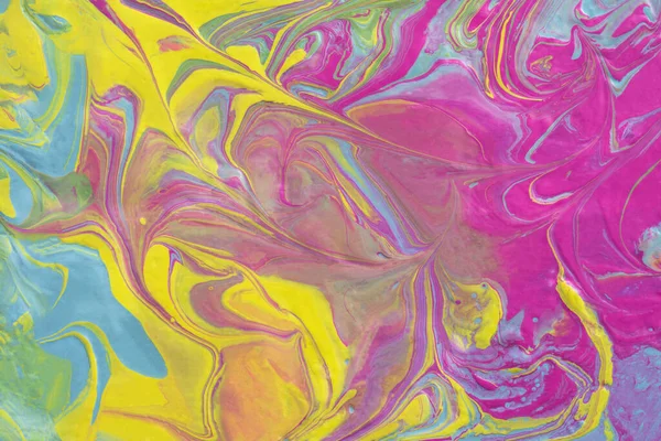 Abstract fluid art texture. A multicolored pictorial fragment of a painting. Bright acrylic drawing of pink, yellow, purple, pale green and blue shades close-up. The concept of summer mood, flowering