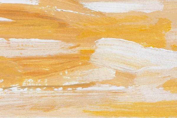 Yellow and white acrylic oil painting abstract background. A fragment of a painting on canvas. Colored beige pastel texture. Modern art, active brush strokes. Summer art background in warm sand shades