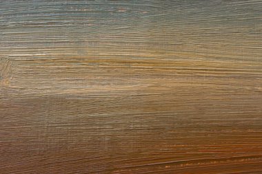 Yağlı boyalı, çok renkli bir arka plan. Tabela ve afişler için el yapımı arka plan. Tuvalin üzerinde kahverengi, kırmızı, kum bej, sarı ve çikolata rengi karışımı. Renkli sanatçı arkaplanı.