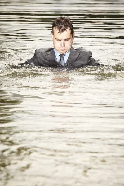 Drowning manager in suit — Stock Photo, Image