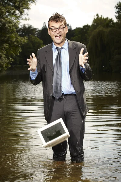 Notebook drop into the water — Stock Photo, Image