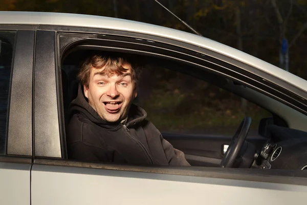 Man Hooded Black Shirt Sitting His Car Making Crazy Face — Stock Photo, Image