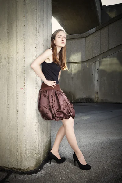 Brunette doll in brown dress — Stock Photo, Image