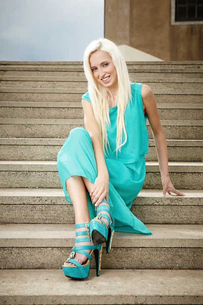 Blonde lady on stairs — Stock Photo, Image