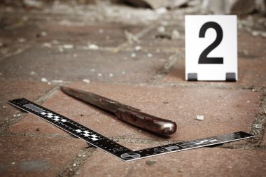 Bloody knife - crime scene investigation clipart