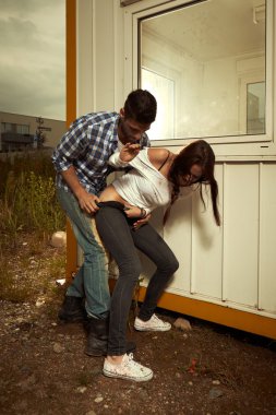Stalker attacking young woman clipart