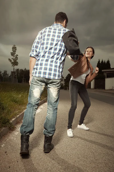 Stalker catching young woman — Stock Photo, Image