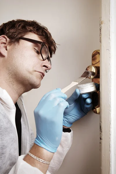 Preparing fingerprint for lifting — Stockfoto