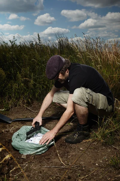 Man hiding his stuff — Stock Photo, Image