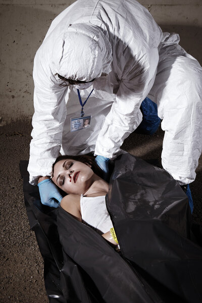 Dead by drugs - woman in body bag