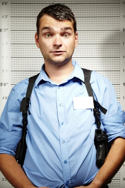 Police officer mugshot in jail — Stock Photo, Image