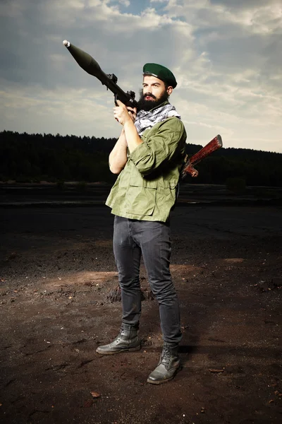 Fighter with RPG and handgun — Stock Photo, Image