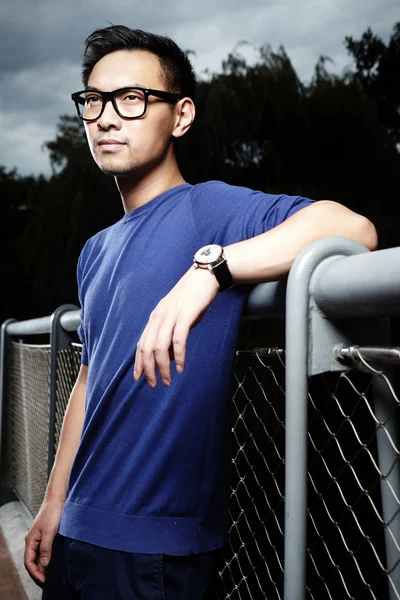 Asian male model in blue shirt — Stock Photo, Image