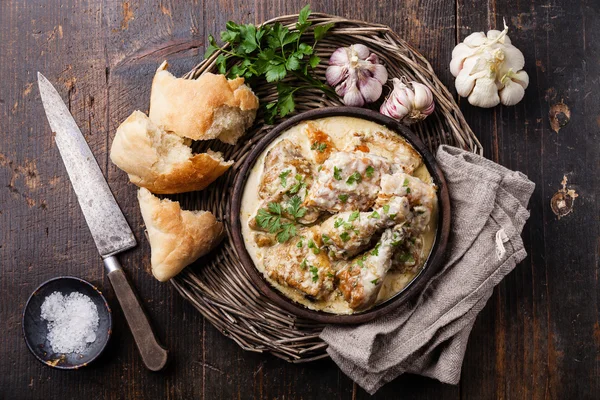 Roasted chicken with creamy garlic sauce — Stock Image Roasted chicken with creamy garlic sauce Stock Image