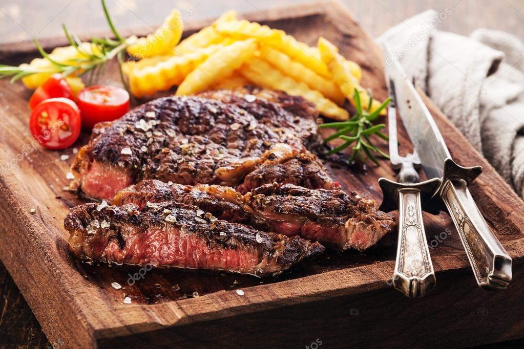 Grilled Steak Ribeye Black Angus — Stock Photo © lisovskaya 78386410