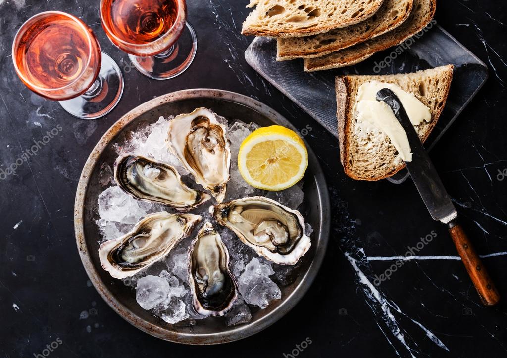Opened Oysters With Bread Butter And Wine Stock Photo By C Lisovskaya Opened Oysters With Bread Butter And Wine Stock Photo By C Lisovskaya