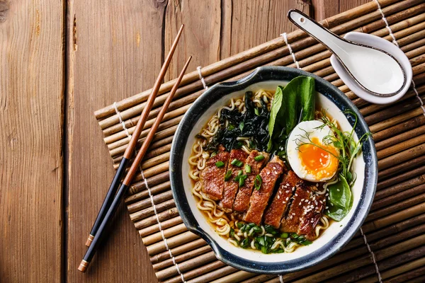 Noodles with egg and pak choi cabbage Stock Image