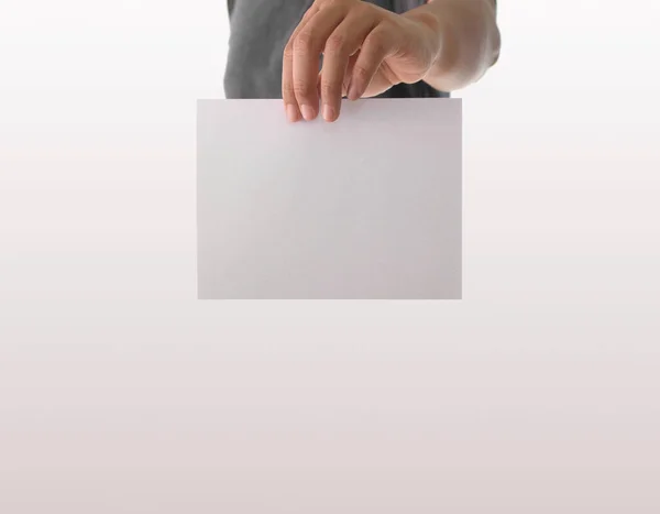 Advertising Hand Holding White Empty Paper — Stock Photo, Image