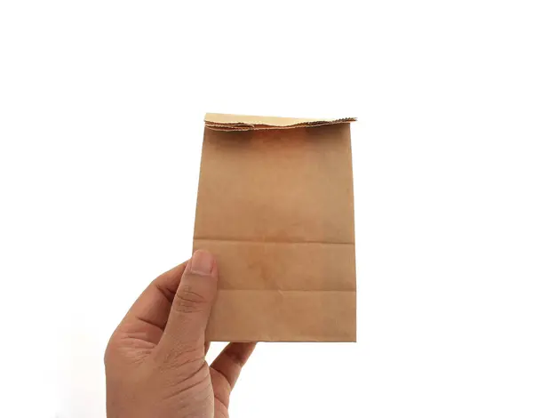 Hand Holding Brown Paper Bag — Stock Photo, Image