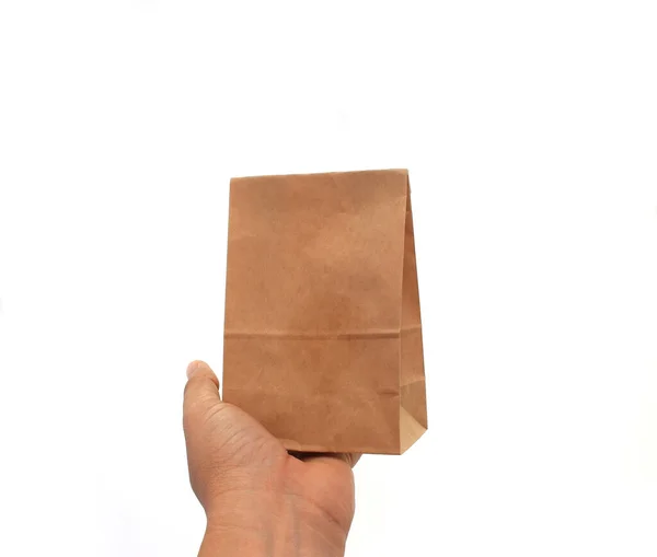 Hand Holding Brown Paper Bag — Stock Photo, Image