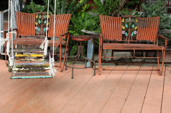 Rusty iron seat swing — Stock Photo, Image