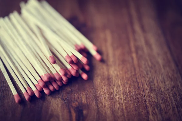 Red matches on wood — Stock Photo, Image