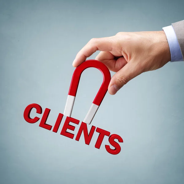 Magnet Attracting new clients — Stock Photo, Image