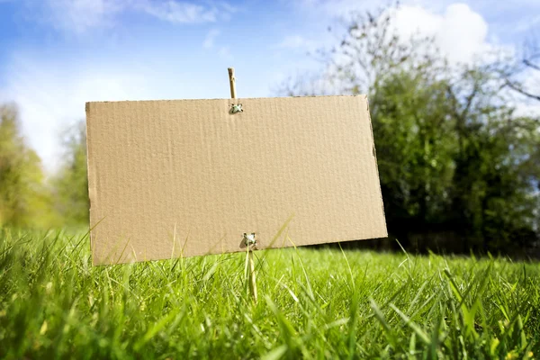 Blank cardboard sign — Stock Photo, Image