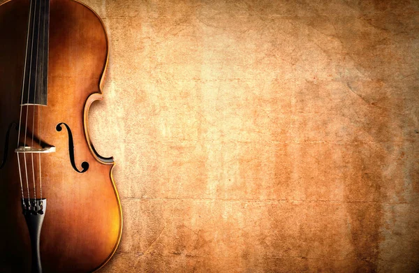 Violoncello Appoggiato Uno Sfondo Grunge Vuoto Con Spazio Copia — Foto Stock