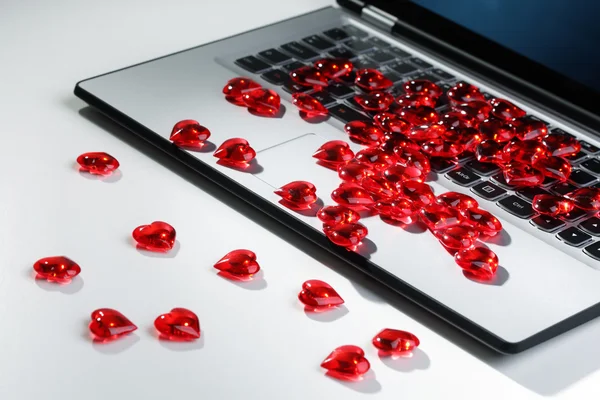 Heart shape symbols on laptop keyboard — Stock Photo, Image